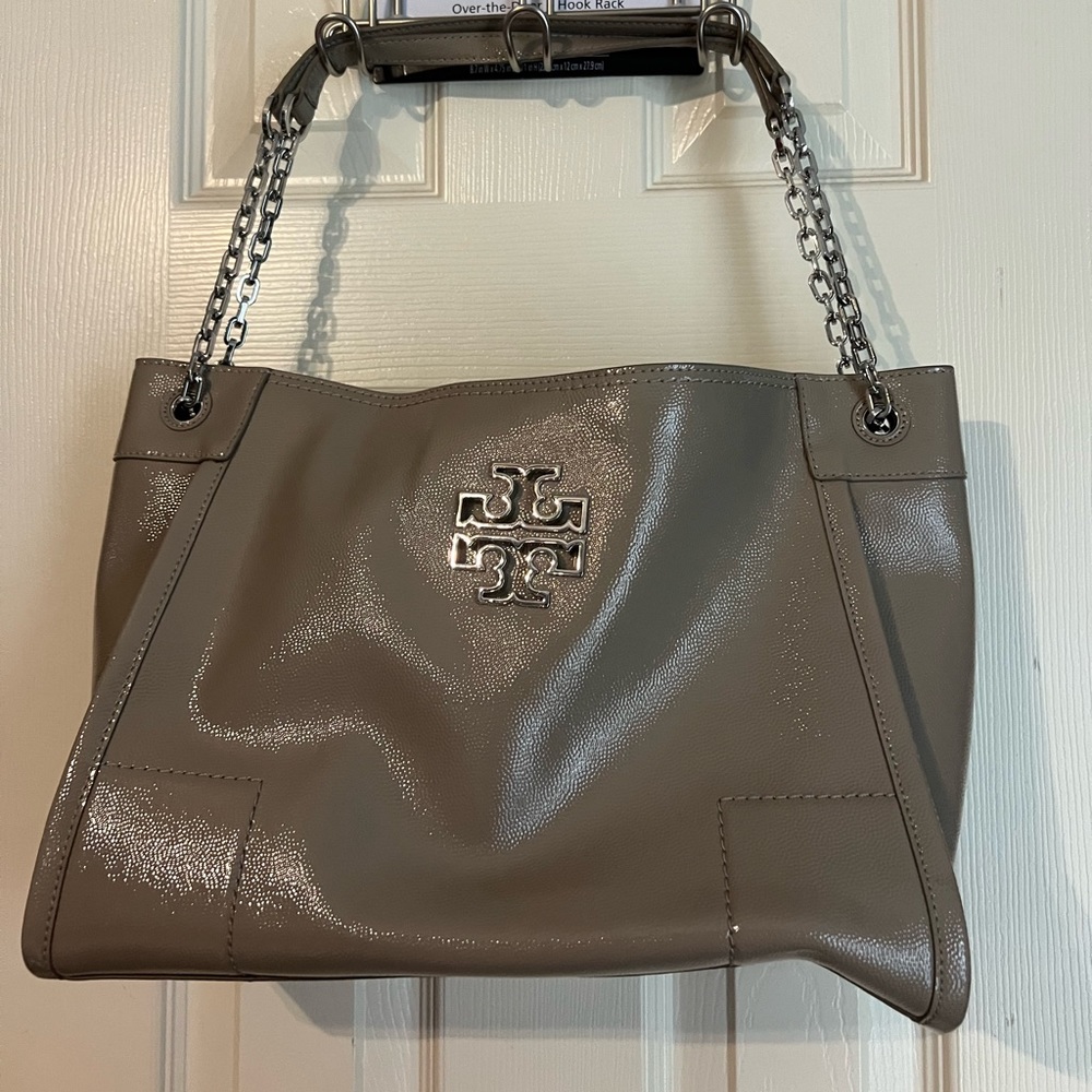 Pebbled patent leather Tory Burch adjustable strap tote bag.